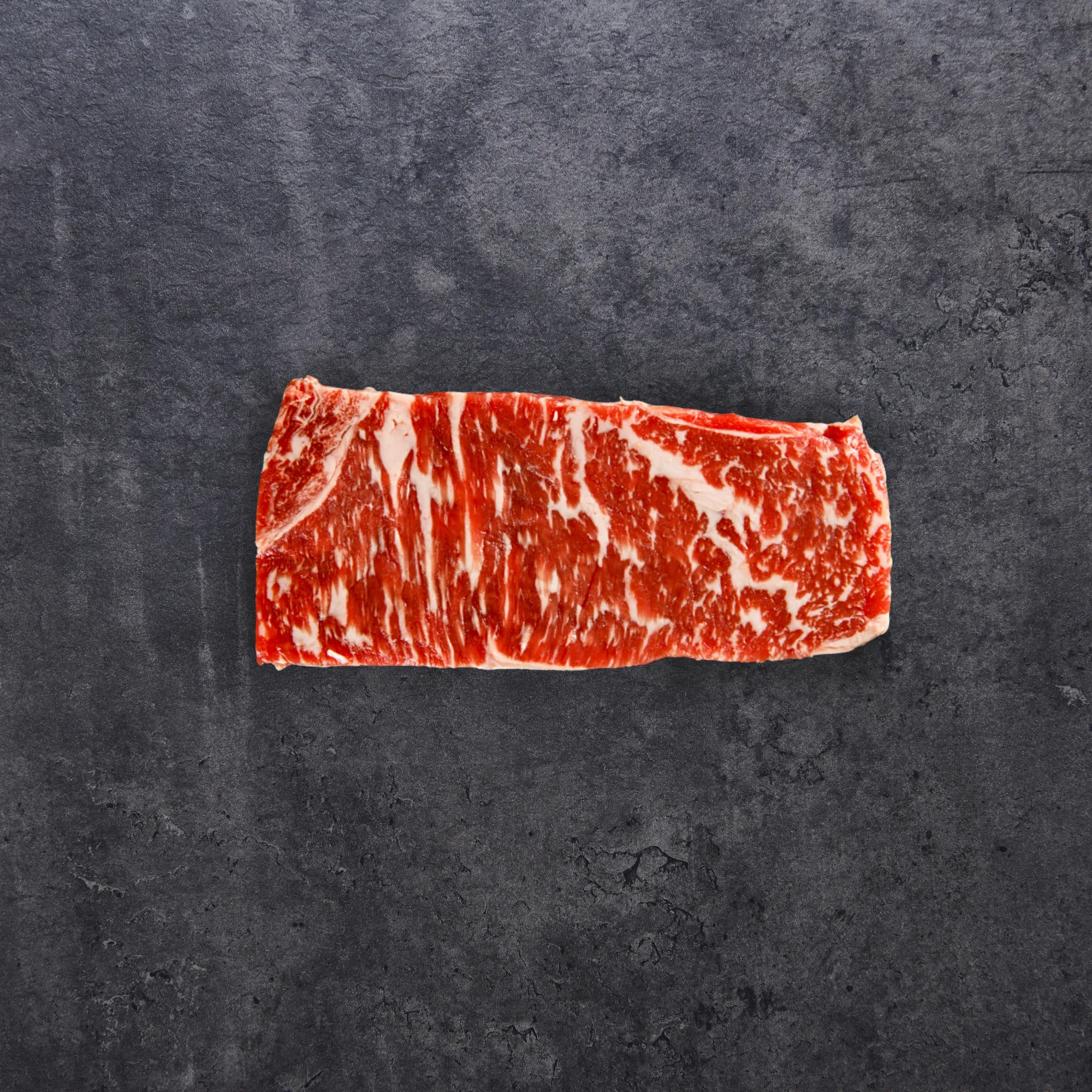 A premium NY strip steak from Jimmy P's Steaks